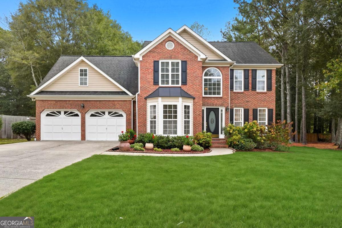 Located in a highly sought after, award winning school district, this stunning home sits on a large, level lot that has proudly earned Yard of the Month multiple times. The home has been meticulously maintained and thoughtfully upgraded over the years, showcasing true pride of ownership. Inside, you will find spacious rooms, an open and flowing floor plan, and gleaming real wood floors that add warmth and character throughout. The open concept kitchen features an inviting eat in breakfast area and top of the line stainless steel appliances, perfect for everyday living and entertaining. Step outside to enjoy the peace and tranquility of the private backyard oasis, complete with a brand new deck featuring built in color changing LED lighting to create the perfect evening ambiance. This home truly combines comfort, style, and curb appeal in one exceptional package.