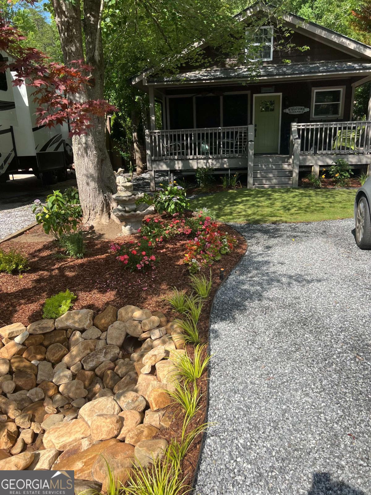 Cute, quaint, and tucked back in a privately gated RV/Camper campground. Welcome home to this charming 1 bedroom 1 bath cabin with a loft. This studio cabin is decked out with cute retro appliances. Has a wrap around porch with a RV/camper hookup up to 30ft long. This neighborhood has a private pool, is very well maintained and manicured landscapes. There is a trout stream in the park for fishing, golf carts allowed to visit the camp grounds, they host seasonal holiday events and activities. Make this quaint little cabin in the woods your home! Cabin sold AS IS.