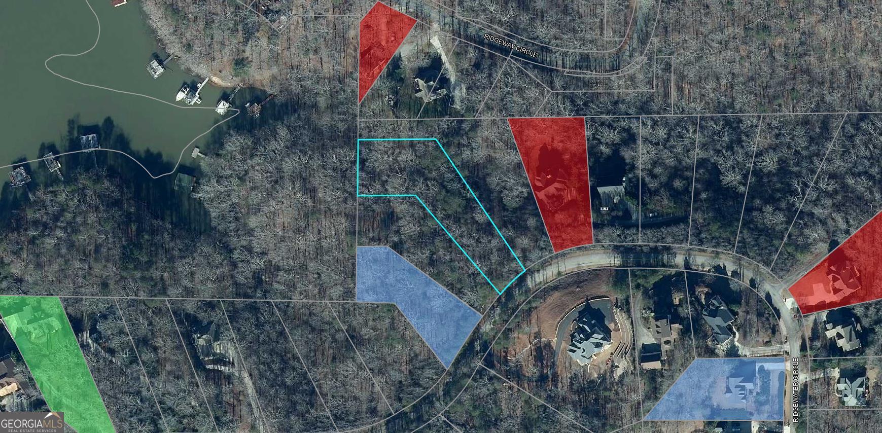 Beautiful lakefront lot located in Ridgewater on Lanier. You'll enjoy the convenience of its proximity to the community owned lot which features a swimming pool and tennis court. Currently obtaining site plan info from the owner. Soil test on hand. Perfect for your dream lake home!