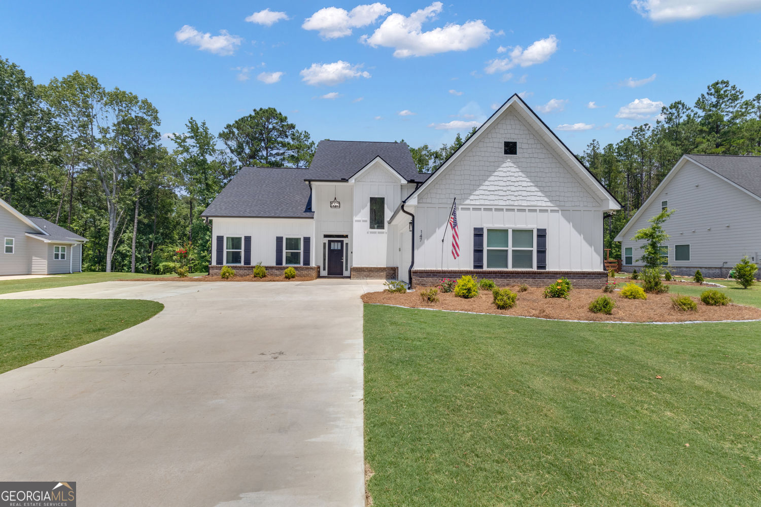 Lakefront luxury awaits at 147 Wolf Creek Cove in The Retreat on West Point Lake! Equipped with a deeded boat slip, this property is a dream come true for lake enthusiasts seeking year-round access to water activities and serene views. From the moment you arrive, you'll be captivated by the timeless design, grand entrance, and meticulous landscaping that frames the property. Inside, discover expansive living spaces filled with natural light, soaring ceilings, and upscale finishes throughout-perfectly curated for both entertaining and everyday luxury. The gourmet kitchen is a chef's dream, featuring high-end appliances, custom cabinetry, and stunning views. The primary suite is a private sanctuary with spa-like amenities, while additional bedrooms provide space and comfort for family and guests alike. Enjoy nature from your large screened-in porch, ideal for relaxing or entertaining. The Retreat is an upscale and private lake home community featuring gated entrances, scenic walking trails, and dedicated storage area for all your recreational needs. Whether you're searching for a full-time residence or a weekend escape, this home offers the perfect blend of privacy, convenience, and lakefront living just minutes from downtown LaGrange. Live the lake life you've been dreaming of-schedule your private tour today!