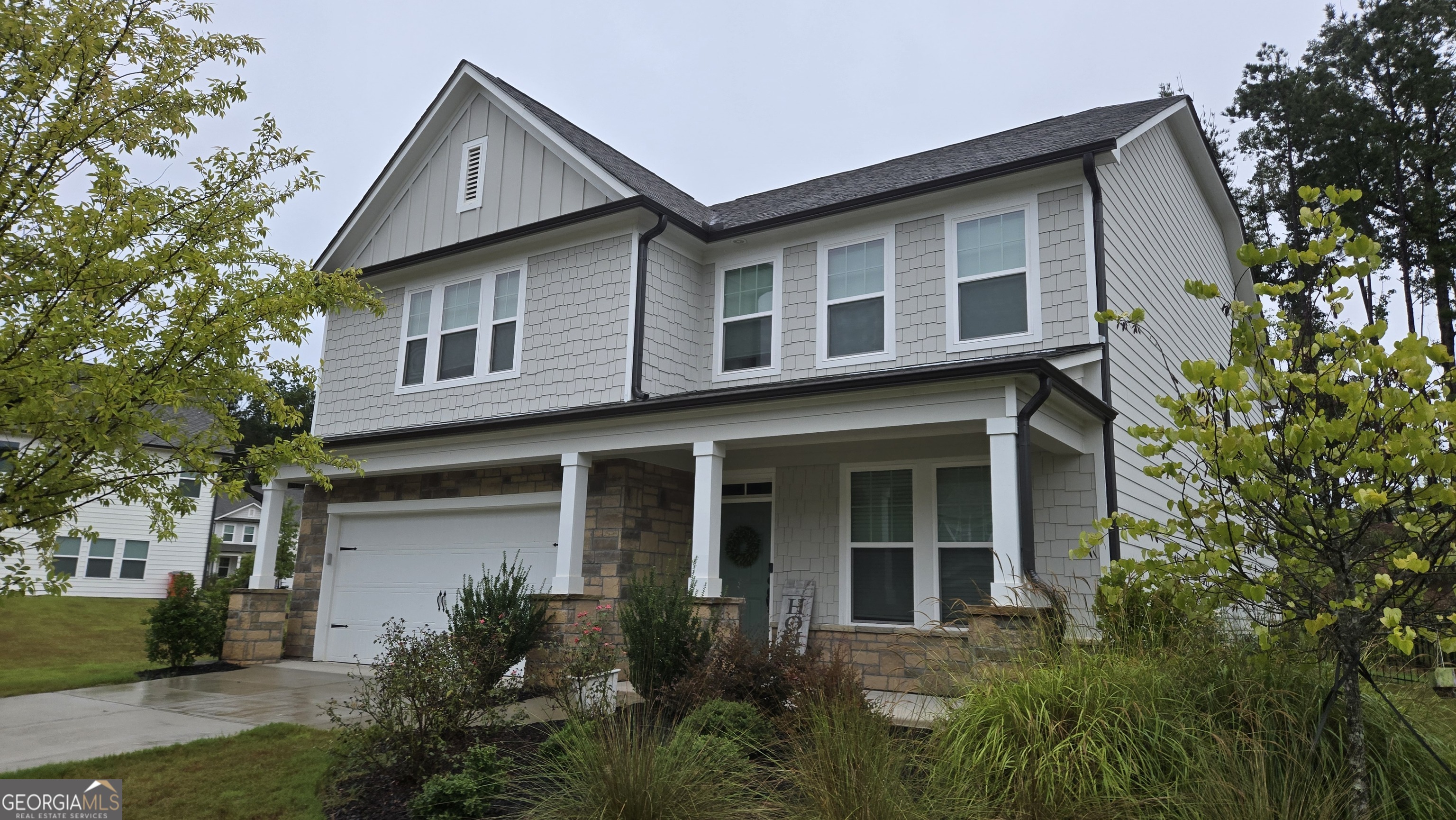 **Professional Pictures Being Added After 8/22**-Come see this gem in the highly sought after, award winning community of Heron Bay. Featuring an amazing community pool with water slides and kids splash pools to cool off in this hot summer. Play a match on the community tennis courts after hitting the fitness center in the lodge. Enjoy a round of golf with beautiful views of the Cole Reservoir and end the evening relaxing by the firepit at the lakeside park. Plus, miles of nature trails and ongoing community activities that give you a feeling of resort living year round! This almost new home features an inviting open living and kitchen space that is great for gatherings of friends and family. With a separate dining room, massive island and a breakfast area, there is plenty of room to spread out. The modern white kitchen features plenty of counter space as well as a butler's pantry with extra storage. Large primary bedroom upstairs features a huge en suite bathroom and walk in closet. Convenient laundry room located upstairs has plumbing already in place to add a utility sink. There is a guest bedroom on the main floor as well for a total of 5 bedrooms. Cozy up in the living room with a gas fireplace that you can turn on with the flip of a switch! Convenient access to I-75 and downtown Locust Grove with unique shopping and restaurants plus the Tanger outlet mall. Come and see if this is the perfect fit for you today!
