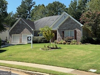 Beautiful, well maintained home in the Parkview School District with the PRIMARY BEDROOM ON THE MAIN FLOOR. Children can walk to Arcado Elementary in this family-oriented community. In addition to the primary suite on the main, there are two nice sized additional bedrooms, and a large separate dining room. The beautiful, custom front door along with the 9-foot, vaulted ceilings brings special charm to the home. For entertaining, you will find that the openness allows for a nice flow among the various rooms. The primary suite is opposite the second and third bedrooms. This home shows the love and attention given to every detail. Most of the home features fresh paint and tile not found in most construction. Come home to a restful, custom patio and enjoy the well landscaped, private shaded backyard. The eat-in kitchen is a feature that will bring many good times around the granite island, which looks through the breakfast room to the patio. Custom cabinets and decorative tile make for a happy chef. Fall is in the air, are you ready to huddle in the family room around the fireplace or watch a little football? All of this in a home that is so convenient to restaurants and shops in Lilburn, Mountain Park, and Stone Mountain. Put this on the top of your list to see right away as it is priced to sell. The home is occupied. Note, backyard and n/w side to have lawn restoration with cooler weather. Make APPOINTMENT - ONLY through Showing Time. Additional information: Myron Martin, listing broker 770-401-4374. Myron Martin Real Estate