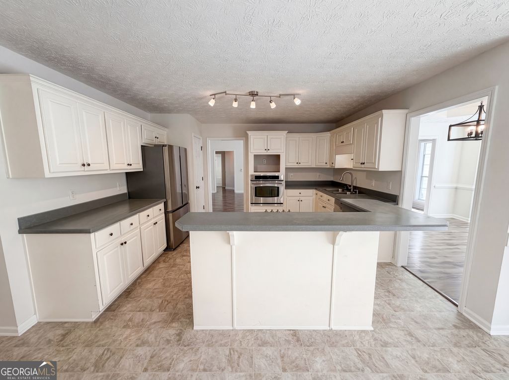 Photo of 170 Camerons Way, Covington, GA 30016 (MLS # 10710423)