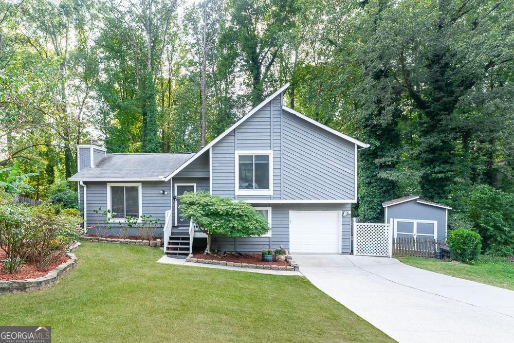 The residence at 5367 Jay Way, Lilburn, GA, represents a unique opportunity within the Lilburn community, presenting a canvas ready for your personal touch. Constructed in 1980, this property offers a solid foundation and the chance to craft a living space that reflects your individual style. The living area provides a comfortable environment for both relaxation and entertainment. Imagine creating a welcoming atmosphere where natural light enhances the sense of spaciousness, offering endless possibilities for arranging your furnishings and decor. This residential property invites you to envision the possibilities and create a home tailored to your specific needs. This home has been lovingly cared for and is move in ready for its new family or owners Lots of special features including brand new interior paint, new Anderson windows, updated kitchen, walk in closet with organization system, walkin tub in master bathroom. Must see it to appreciate it Multiple offers received HIghest and best offer requested by Thursday 9/25 at 6pm