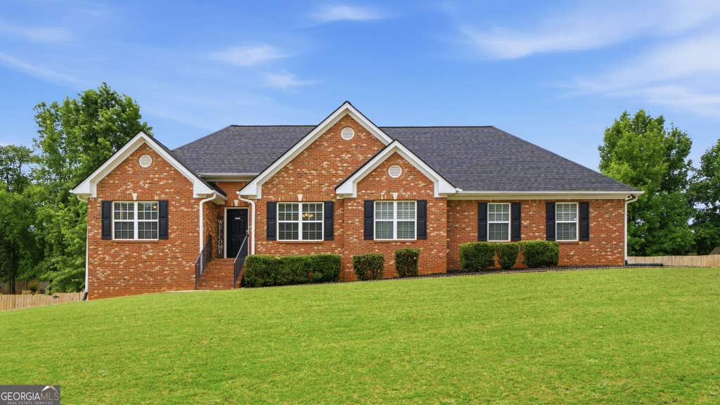 Photo of 112 Dorsey Springs Drive, Hampton, GA 30228 (MLS # 10789936)