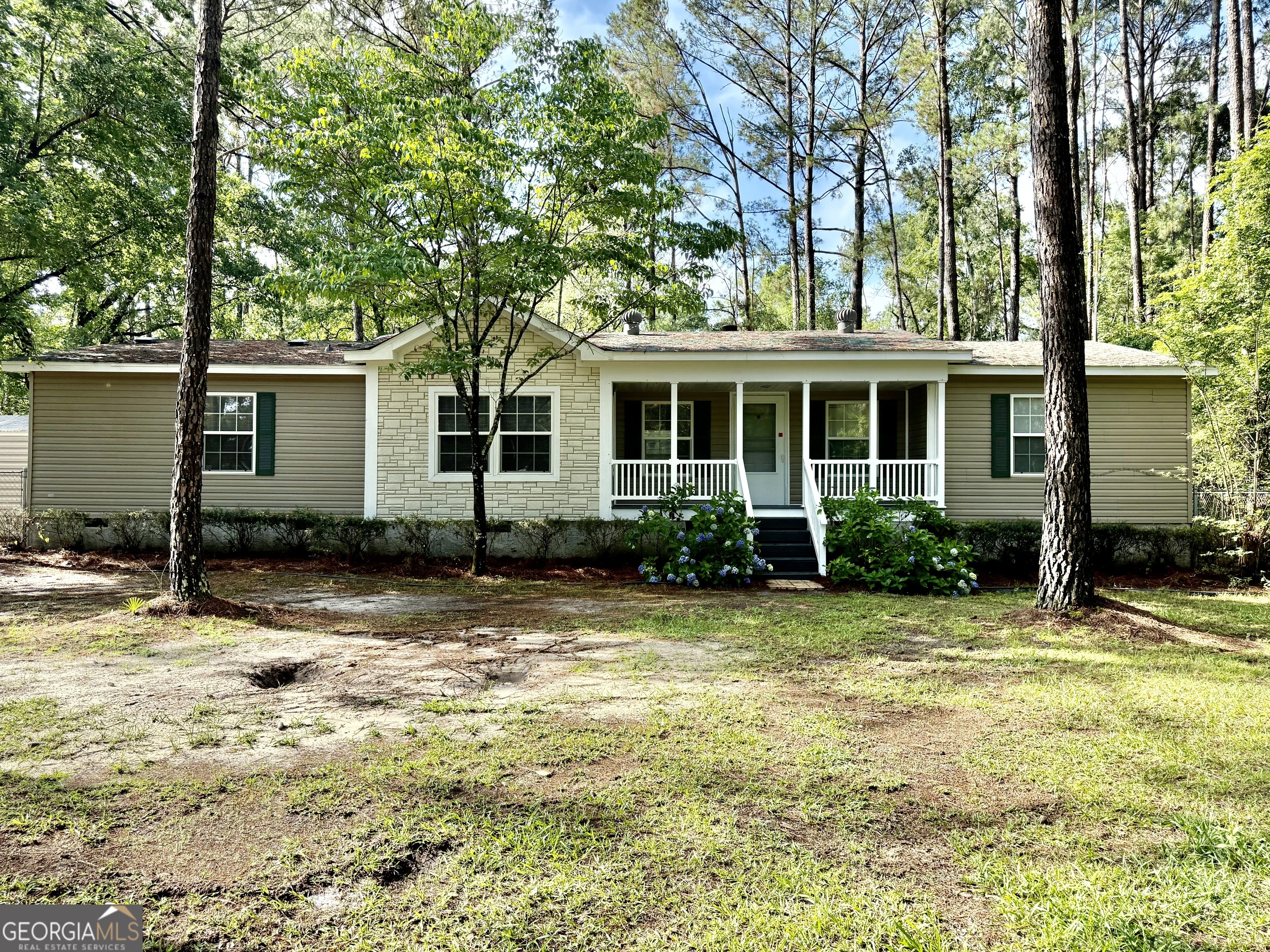 SELLER IS OFFERING $5000 CONTRIBUTION TO YOUR CLOSING COSTS! Come check out this Newly Renovated 3 bedroom 2 bath home situated on 3.29 acres in Claxton, GA!! This home has new cabinets, kitchen appliances, new LVT waterproof flooring, freshly painted walls and more. This property includes 2 outdoor storage buildings and a detached carport. Call the listing agent to schedule your showing. Deed Restrictions Apply.