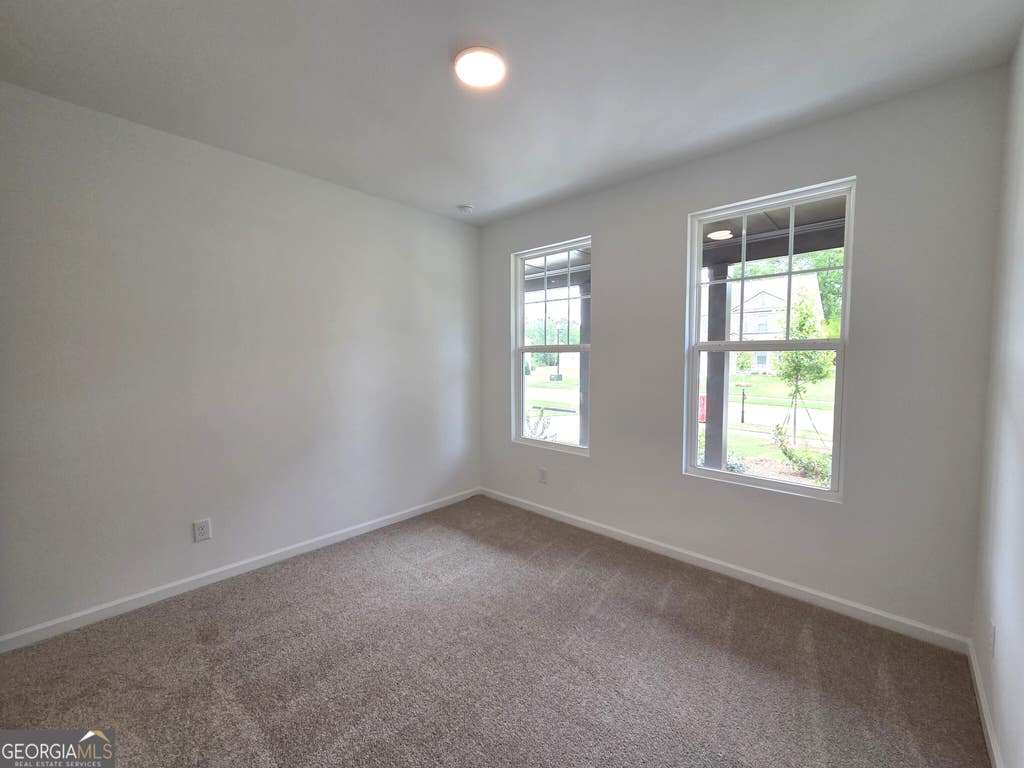 Photo of 7320 Tenton Crossing, Locust Grove, GA 30248 (MLS # 10811713)