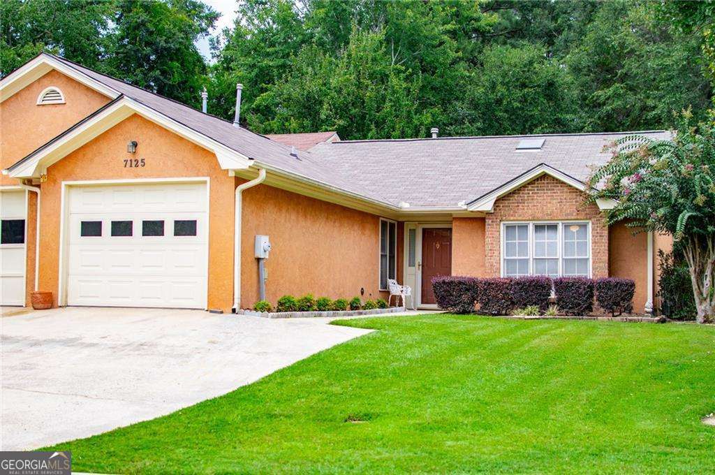 Looking for the perfect retirement home? Come see this 2 bedroom townhome with brick & stucco front located in the 55+ community of Union City. The eat-in kitchen is perfect for hosting family and friends. The lovely skylights throughout make it a bright and cheerful home. The kitchen features tiled countertop a convenient pantry wood floors. You have your own 1 car garage and easy access to shopping, restaurants, and transportation. Close to the Interstate, Atlanta and the Hartsfield/Jackson Airport. Jack & Jill Bath with 2 separate vanities. **This townhouse is being sold AS IS.* Enjoy the features of an association that maintains the exterior and yard for you.
