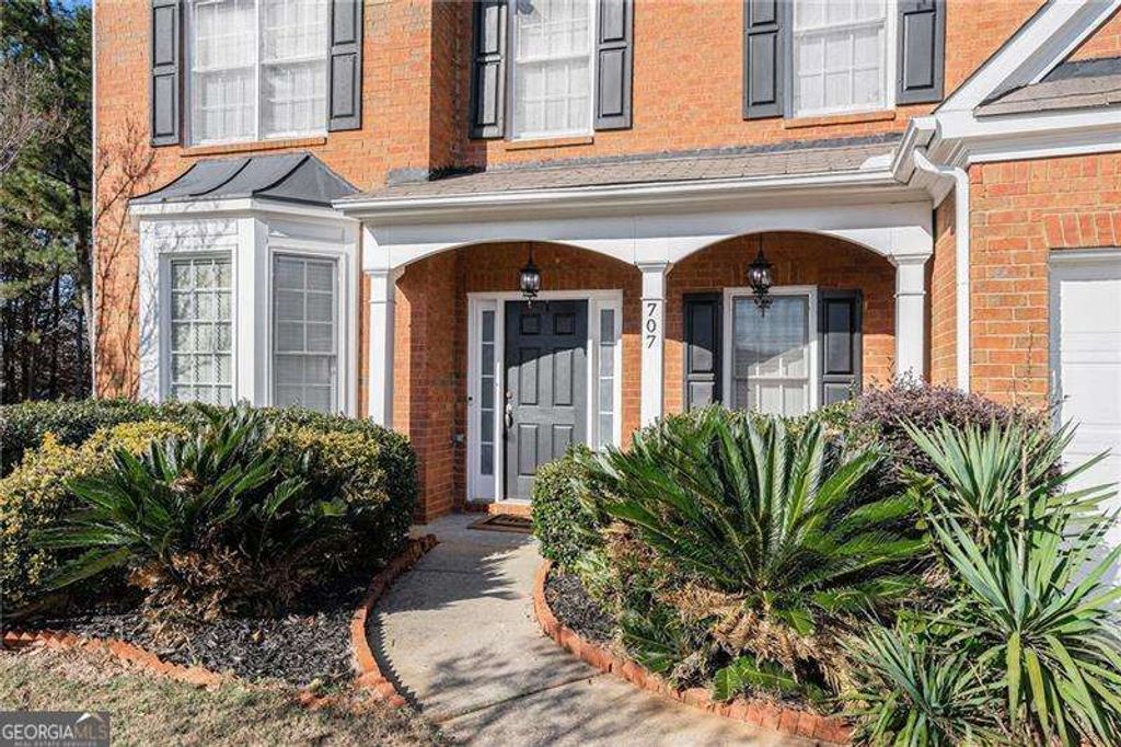 Photo of 707 Herman Tanner Place, Lawrenceville, GA 30044 (MLS # 10657953)