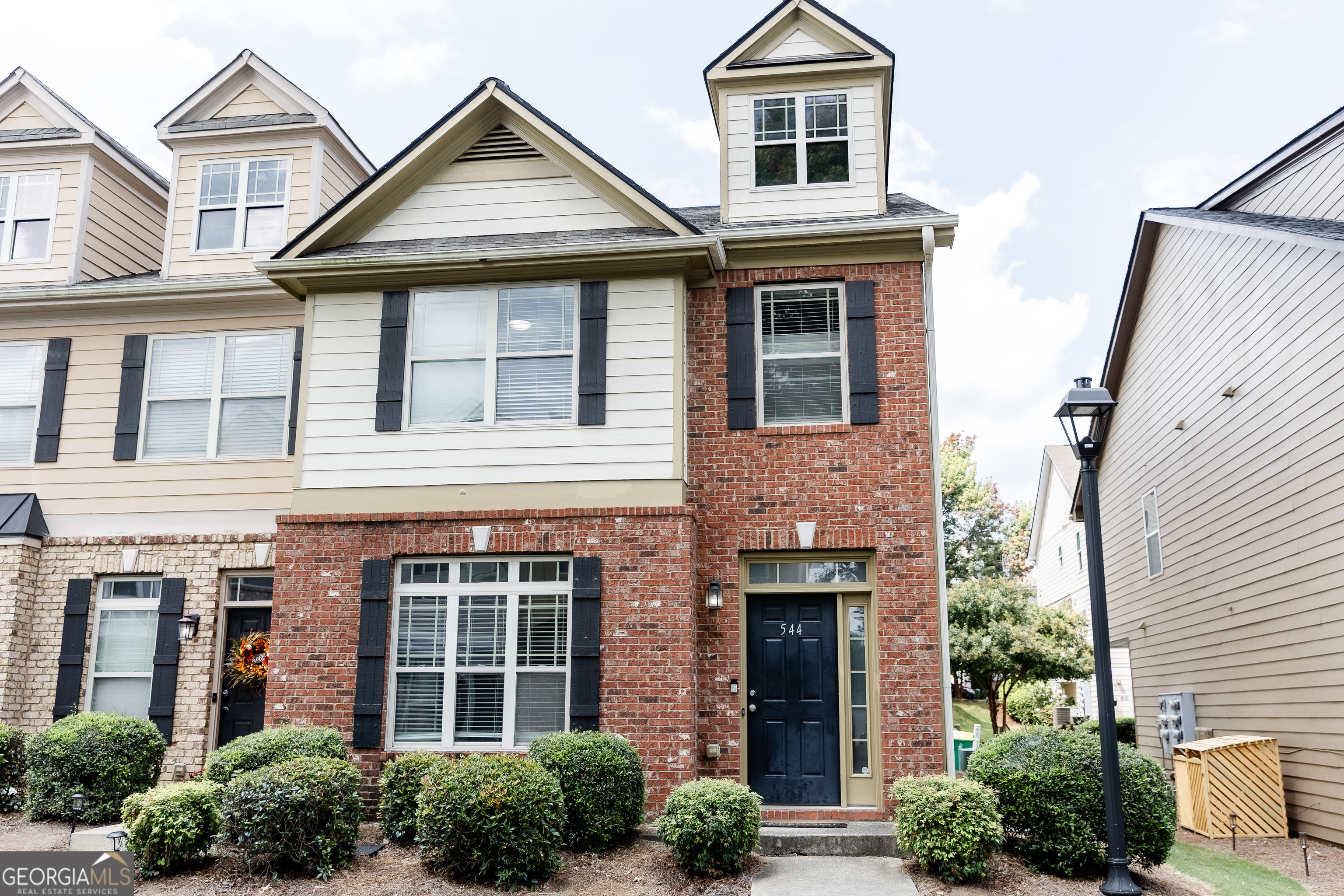 This beautiful END-UNIT townhome is one of the largest in River Park and is move-in ready! The upper level offers 3 spacious bedrooms, including an oversized master suite with tray ceilings, a walk-in closet, and dual vanities. A total of 2.5 baths provide plenty of convenience for the household. The main level features an open-concept design with a welcoming family room, dining area, and Kitchen. River Park HOA includes a pool, tennis courts, clubhouse, fitness center, playground, picnic area, fire pit, and sidewalks on both sides of the street. Enjoy easy access to I-575, Downtown Woodstock, The Outlet Shoppes, restaurants, shopping, entertainment, and more.