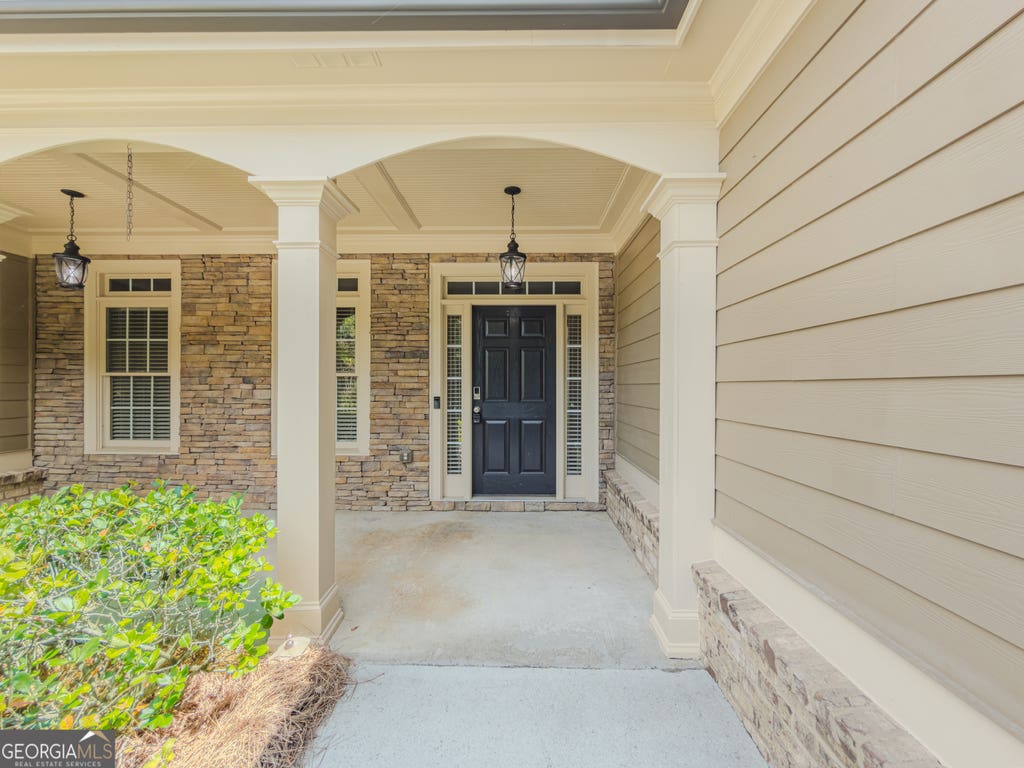 Photo of 517 Richmond Place, Loganville, GA 30052 (MLS # 10786438)