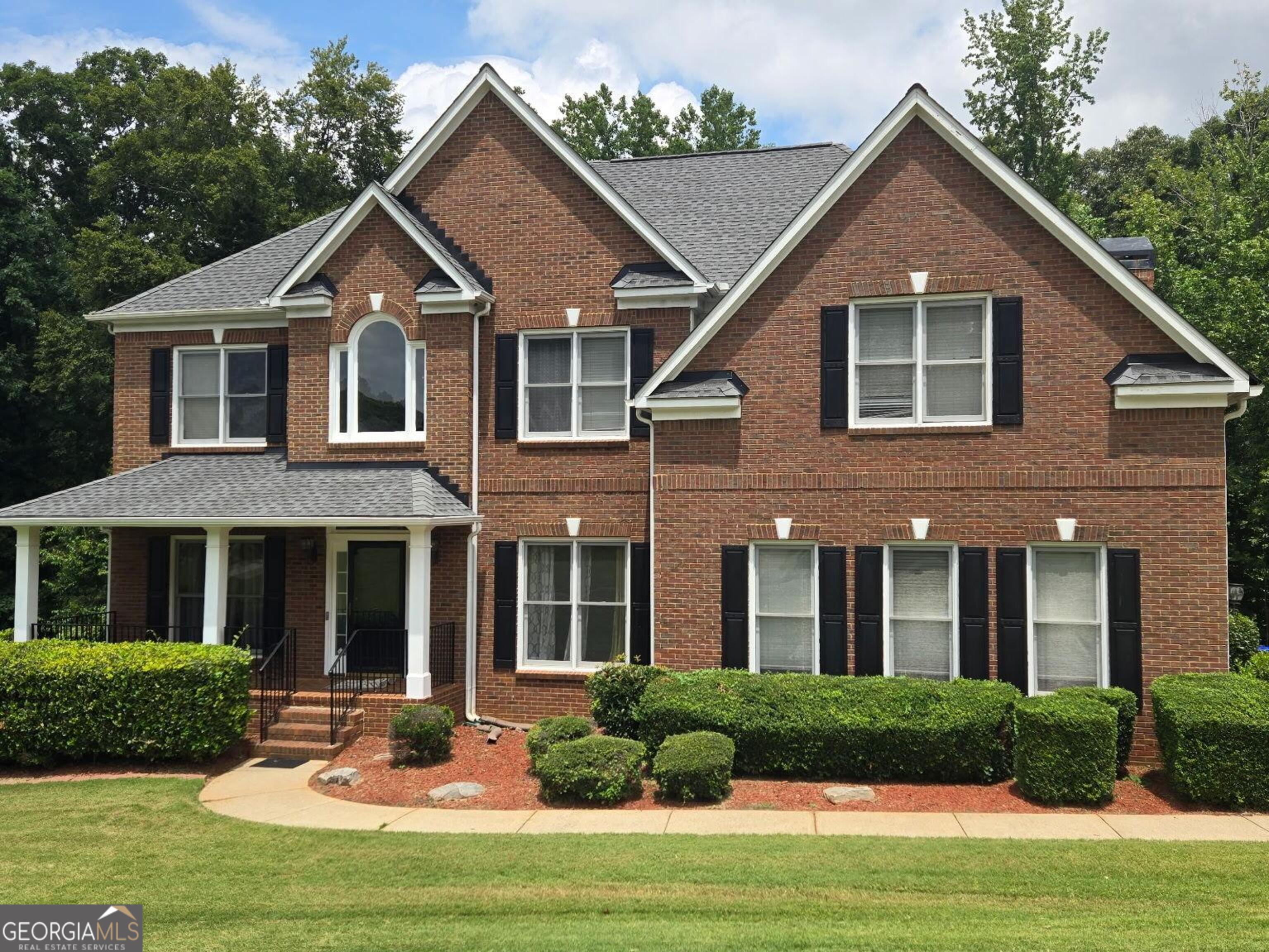 Gorgeous 3-Sided Brick Home with Grand 2-Story Family Room & Unfinished Basement Welcome to this stunning 4-bedroom, 3.5-bath upscale home featuring a side-entry garage and hardwood floors throughout the main level. Step into the dramatic 2-story foyer, which flows seamlessly into a grand living room and oversized dining room-perfect for hosting family and friends. The chef-inspired eat-in kitchen boasts an island, granite countertops, hardwood floors, and a bay window with access to the back deck, overlooking the soaring 2-story family room with fireplace. Upstairs, retreat to the luxurious owner's suite featuring a spa-like bathroom with dual vanities, garden tub, separate shower, and a huge walk-in closet. Three additional spacious bedrooms and two full bathrooms complete the upper level.