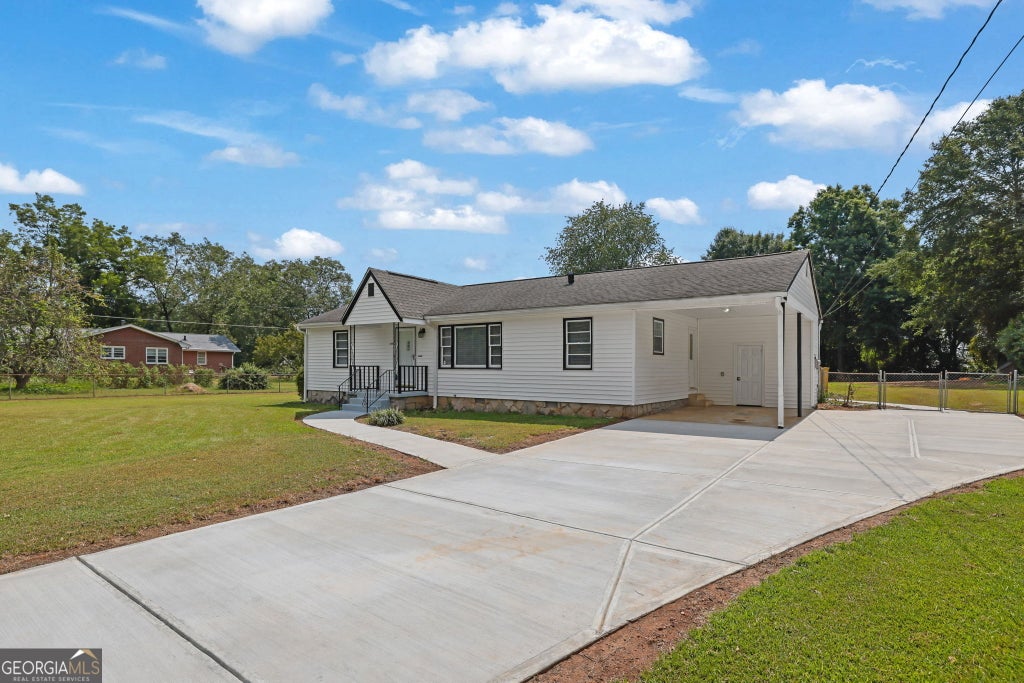 Photo of 1655 Lucelle Avenue, Stone Mountain, GA 30087 (MLS # 10835751)