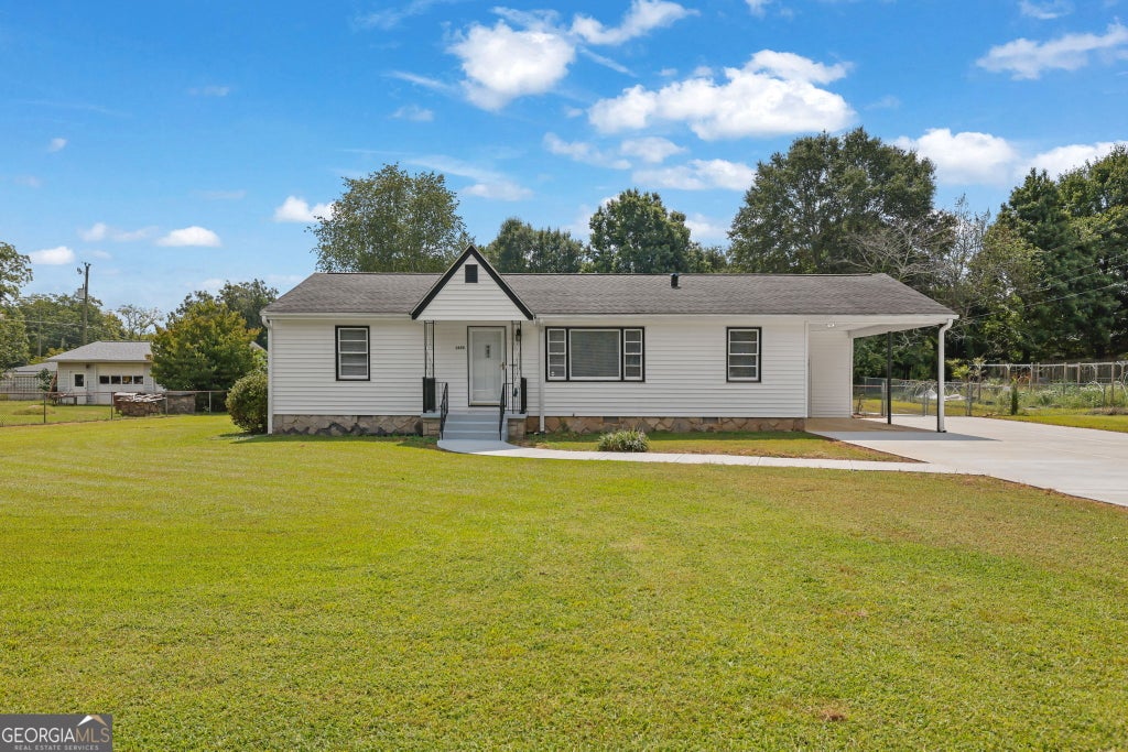 Photo of 1655 Lucelle Avenue, Stone Mountain, GA 30087 (MLS # 10835751)