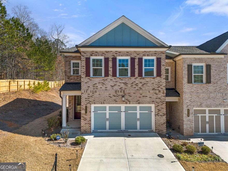 Welcome to this rare End-unit Townhome located in gated swim community of Magnolia Walk. This beautiful and well maintenance 3 bedroom and 2.5 bathroom home offers open concept living perfect for entertaining and relaxation. Main level features gourmet kitchen with white cabinets, quartz countertops, stainless steel appliances and a large island opening up to the spacious and bright family room with fireplace and breakfast area overlooking backyard with covered patio. Second floor features spacious master suite, ensuite bathroom with walking shower, double vanities, and a walking-in closet. Additional two bedrooms, full bathroom, laundry room and a spacious loft area completes second floor. Conveniently located minutes away from GA 400, shopping, restaurants and parks including Halcyon, Avalon and Fowler Park. The HOA covers all amenities, exterior building, lawn maintenance and trash.   Alpharetta address with Forsyth county taxes tops everything this beautiful has to offer.