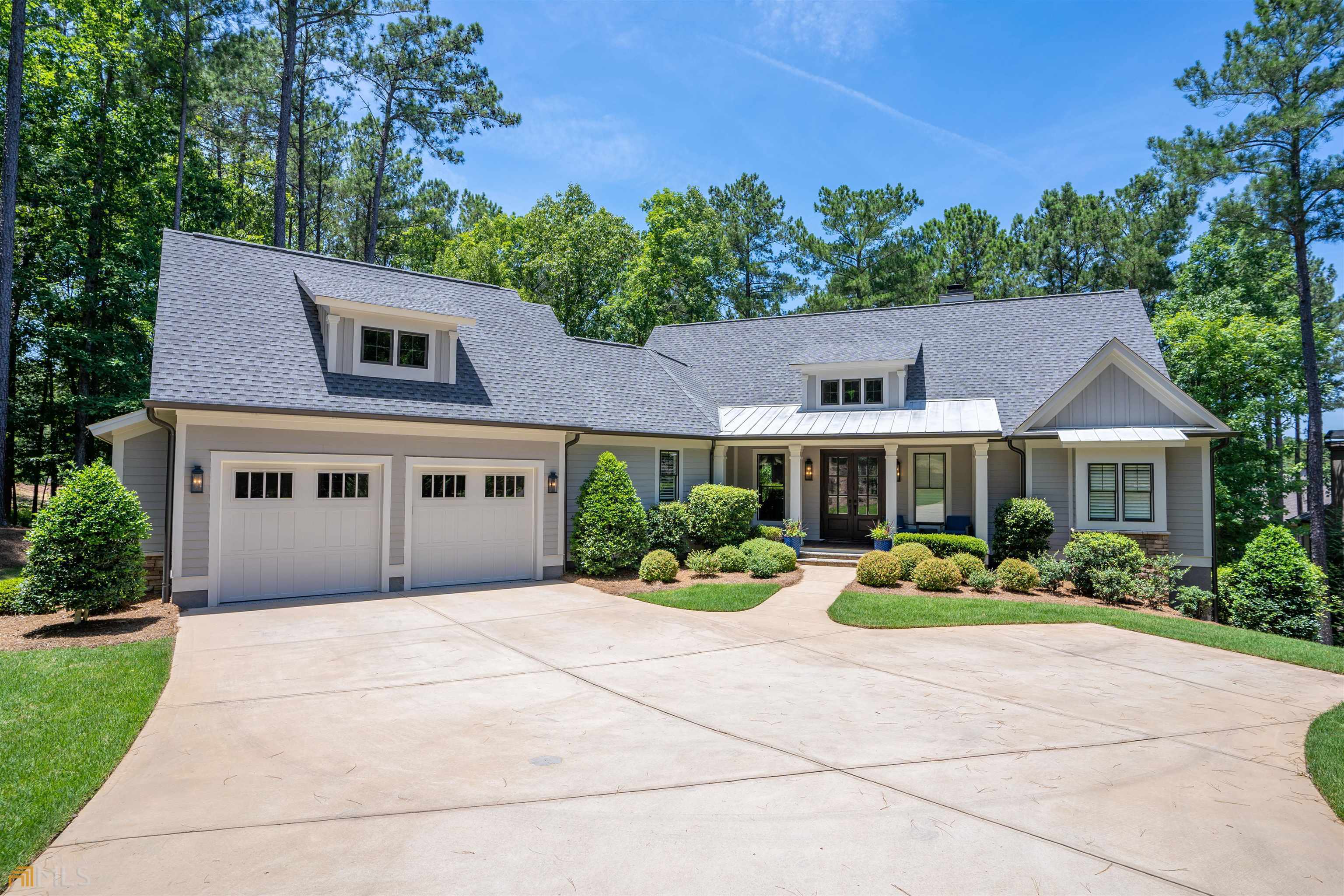 Shows like a Model Home! 5 BR/4.5 BA home on the Creek Club Course with room for everyone. Only one very meticulous owner. New Additions include: Kitchen Re-Configuration, 2 Fisher and Paykel drawer dishwashers, new Refrigerator, Built-In Microwave, Wine Refrigerator, 5th Bedroom/Office above the garage complete with custom Built-Ins and full bath. Garage features custom floor coating and cabinetry with its wall was moved out to incorporate interior stair case and to enlarge garage entry area. Outdoor living at its finest with NEW large, custom outdoor Fire Pit and NEW Hot Tub that seats 14, two Covered Porches & Grill Deck surrounded by new Landscaping. The seller has made a club membership available.