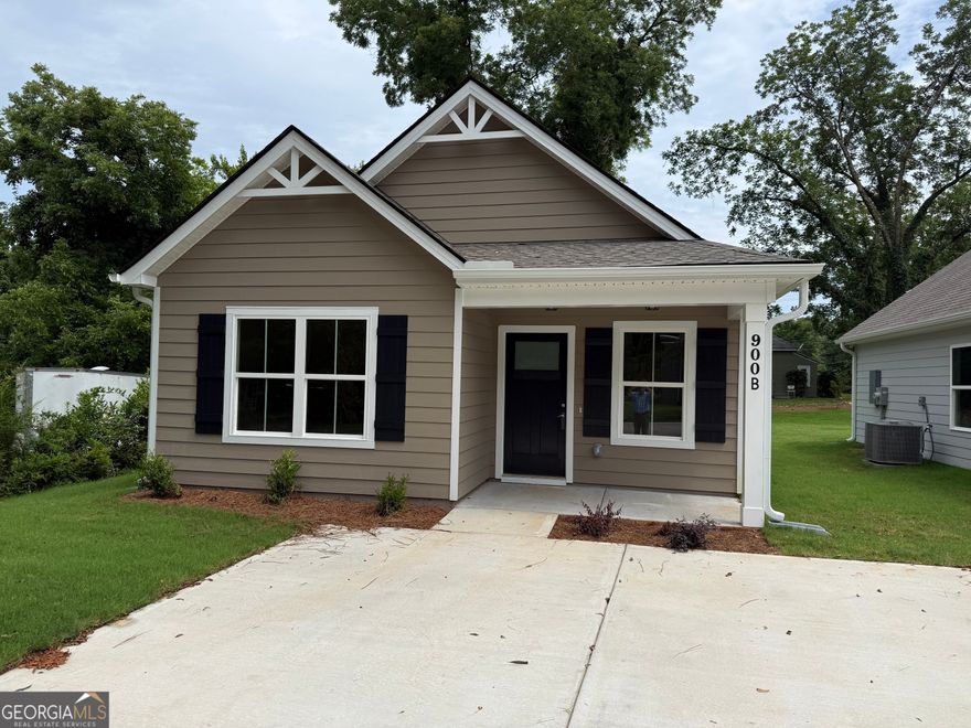 It is Ready.......$10,000 builders allowance toward closing until November 15th and additional $1,000 in preferred lender incentives. Great affordable new 2 bedroom home convenient The Thread, Downtown, college and shopping. Carpet in Bedrooms and Luxury Vinyl Tile in all other areas. Granite counter tops in Kitchen and baths.