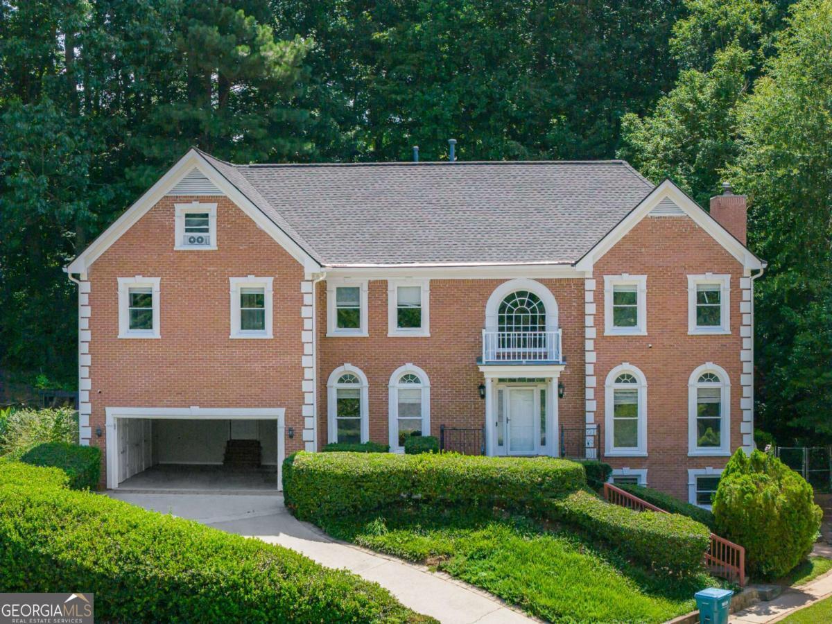 Welcome to your to your dream home in the prestigious Belgrave Square Community, ideally located in the highly sought-after Tucker and Lilburn area. This stunning residence features 6 spacious bedrooms and 4.5 bathrooms, offering an exceptional blend of comfort and functionality. The main level includes a formal living room, a separate dining room, and a bright, sunny eat-in kitchen with an island, granite countertops, and stainless steel appliances. The cozy family room with a fireplace and wet bar opens to a massive great room-perfect for entertaining. Upstairs, you'll find an oversized primary suite complete with a private sitting room or office and a large walk-in closet. The fully finished basement adds even more living space and includes a bedroom, full bathroom, kitchen, sitting area, and ample storage-ideal for extended family, in-laws, or guests. Enjoy the beautifully landscaped private backyard featuring a covered sitting area, outdoor kitchen, expansive deck, wooden swing, and basketball court-all surrounded by nature. Whether hosting a private party or enjoying a quiet family picnic, this home offers the perfect setting indoors or out. Additional Highlights: Roof and HVAC replaced in 2021 Ideal for multi-generational living Prime location with easy access to major amenities Do not miss this incredible opportunity-make it yours today before someone else does!