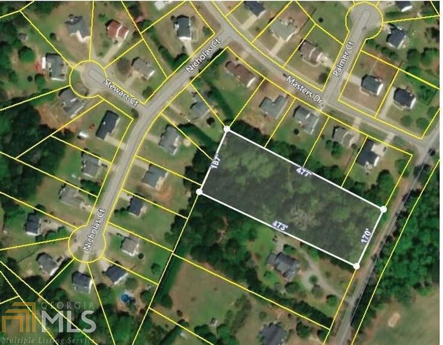 Beautiful 2 acre lot across from Monroe Golf and Country Club located in the city limits of Monroe with all utilities available (water,sewer,gas,electric).This lot can be divided into (2) 100 ft lots per city of Monroe Planning & Zoning. What a great opportunity to purchase this gorgeous lot in the Atha Road,Youth Middle and Walnut Grove Highs School cluster.Sold as-is.