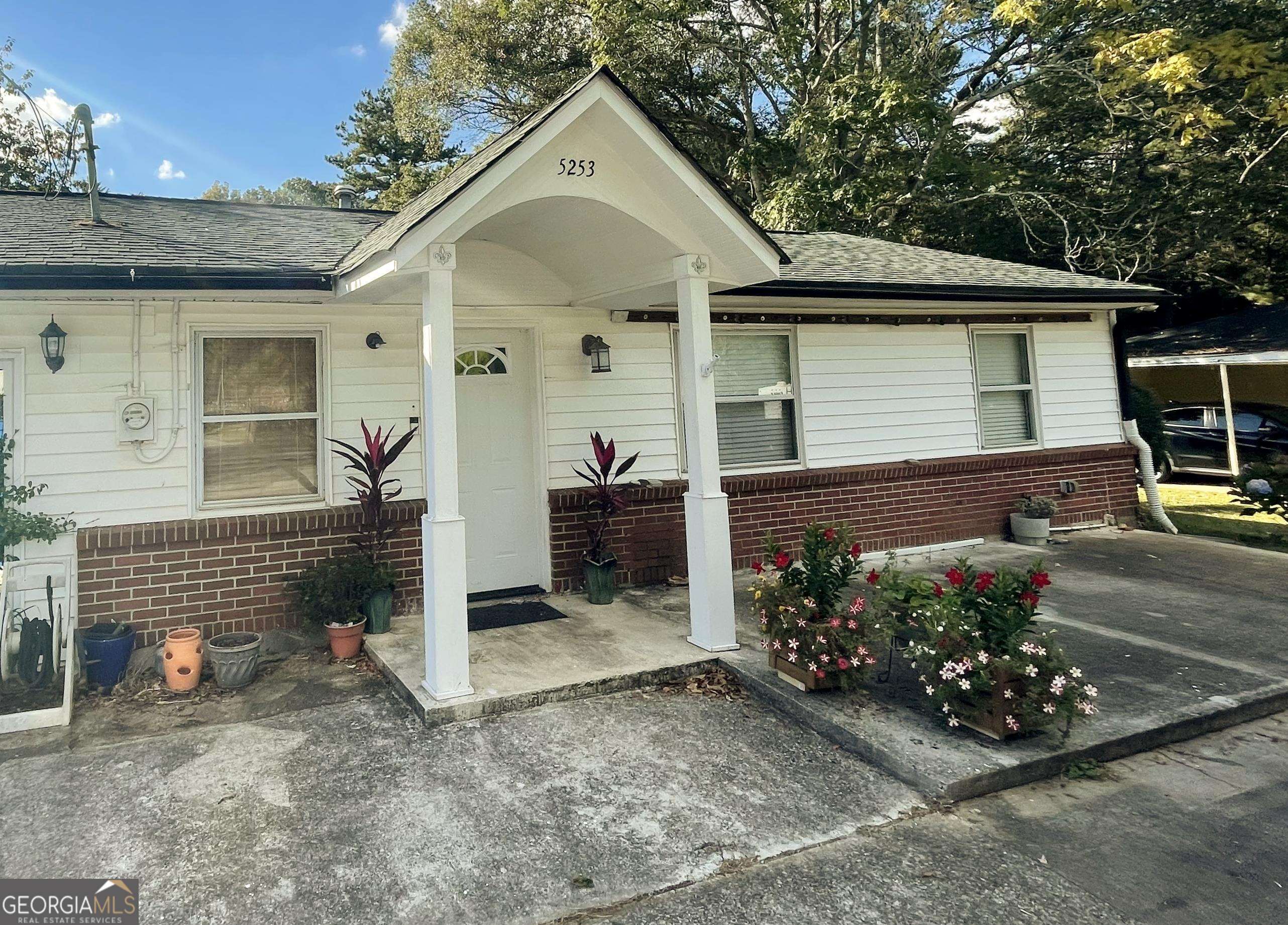 PRICE REDUCTION!! This adorable ranch home on a level lot in a quiet established neighborhood is just waiting for your updates! Perfect for investor or first-time home buyer looking to put their own touches on a home. Carport has been enclosed to add additional square footage for 3rd bedroom/laundry/family room, whatever you want it to be. Large level backyard with privacy fence, and a huge workshop/ storge building. Super convenient location gives you quick access to downtown Atlanta, Farmers Market or anywhere in the world with Hartsfield just minutes away.