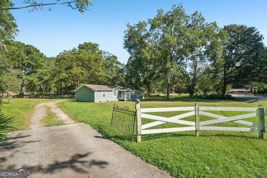 Photo of 718 Panola Road, Ellenwood, GA 30294 (MLS # 10845864)