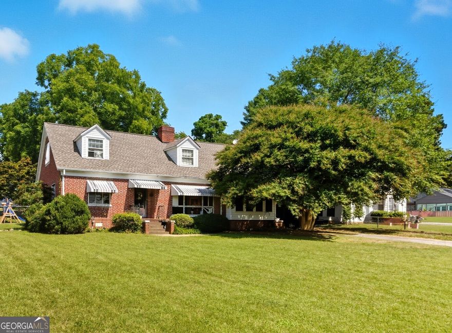 Investor Special - priced at only $81/sf - 4 BR / 2 BA, ~2,505 SF, two levels (2 up / 2 down) with dual fireplaces with gas logs. Roof replaced 2024. Vinyl soffits.   Sold "as is".  Currently rented to same tenate for 11 years.   Utilities: Georgia Power + City of Toccoa (natural gas, water, sewer, trash).    Property is sold as is - ideal for investors or buyers looking for a renovation project. New survey 2025.