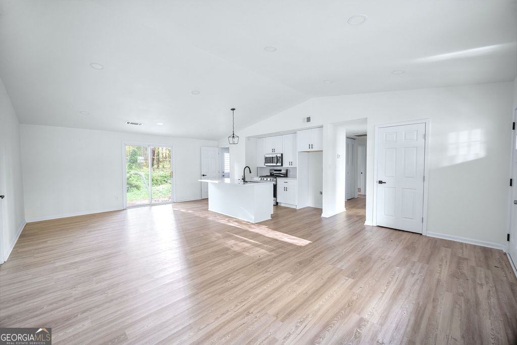 Photo of 1428 Muirfield Drive, Stone Mountain, GA 30088 (MLS # 10735970)