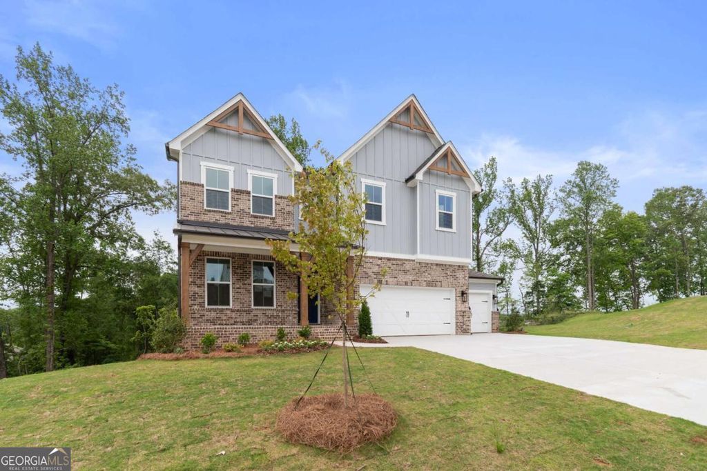 Photo of 7515 Woolf Way, Cumming, GA 30028 (MLS # 10682978)