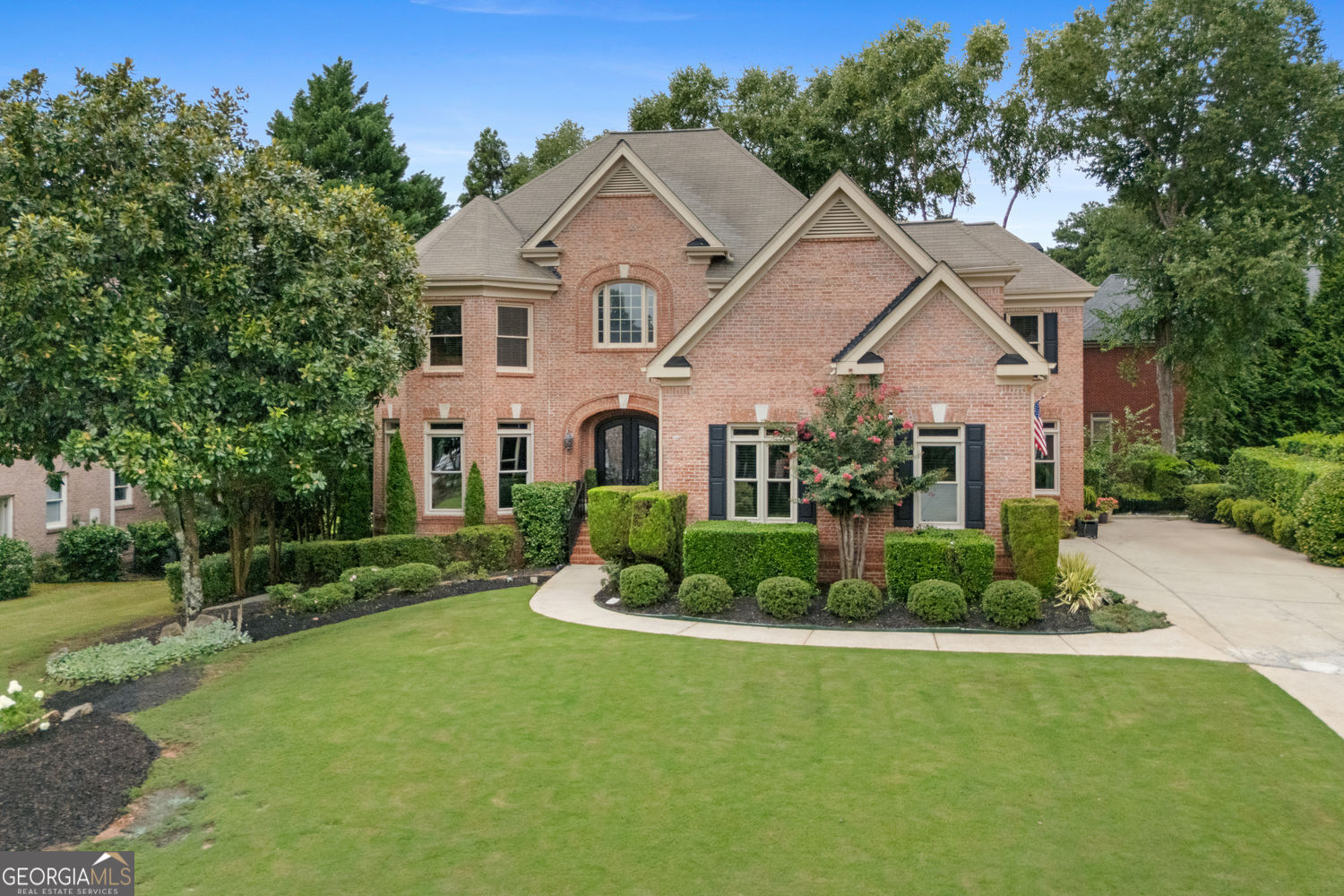 Welcome to Deerlake - South Forsyth's Premier Swim & Tennis Community! Located in the heart of South Forsyth and zoned for award-winning Brookwood Elementary, South Forsyth Middle, and Lambert High School, this freshly painted exceptional 5 bedroom, 5 bath home offers over 6,000 square feet of thoughtfully designed living space, perfect for today's modern lifestyle. Upstairs features four spacious bedrooms and three full updated baths, including an oversized primary suite with a private sitting area with an updated spa-style bath with soaking tub, frameless shower, and dual vanities. Large secondary bedrooms include walk-in closets, and the upper hallway offers three additional large storage closets. The main level boasts a two-story foyer, elegant formal living and dining rooms, and a light-filled two-story family room with a wall of windows and custom built-ins surrounding the fireplace. The chef's kitchen includes a granite island with gas cooktop and stainless appliances. Also on the main level: a guest bedroom with full bath and a large laundry room off the 3-car garage. The fully finished terrace level (2000+ sq ft) offers exceptional space and flexibility, featuring a large family room, separate billiards/game room, updated full bath, and a bar/lounge area that opens to a sitting room and private office-which could easily function as a 6th bedroom. Deerlake is a vibrant, amenity-rich community with a junior Olympic swimming pool, playground, clubhouse, tennis courts, pickleball, basketball court, lake with dry dock, and soccer and baseball fields-perfect for an active lifestyle. The active community offers swim team and various levels of tennis teams with pros available to juniors and adults. 5 minutes away residents will soon enjoy the highly anticipated Johns Creek Medley development scheduled to open in 2026, bringing luxury shopping, dining, and entertainment to your doorstep. Confirmed tenants include Capital Grille, a neighborhood grocer, Sephora, Rena's Italian Fishery & Grill, Cafe Intermezzo, High Country Outfitters, BODYROK, Petfolk, Ford Fry's Little Rey, CRU Food & Wine Bar, Fado Irish Pub, Playa Bowls, Summit Coffee, Lily Sushi Bar, Knuckies Hoagies, Cookie Fix, Sugarcoat Beauty, BODY20, AYA Medical Spa, 26 Thai Kitchen and Bar, Five Daughters Bakery, Drybar Shops, Minnie Olivia, Burdlife, Amorino, Pause Studio, Fogon and Lions and Clean Your Dirty Face to name a few. Medley serves as an important part of Johns Creek's 192-acre Town Center Vision and Plan, which will weave together quality housing, restaurants, retail and offices through new public pathways and parks, furthering the walkable lifestyle for residents. 10-20 minutes from Halcyon, the Collection (Whole Foods) and Avalon.