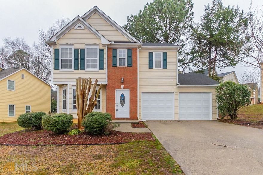 This Kennesaw two-story home offers a two-car garage.