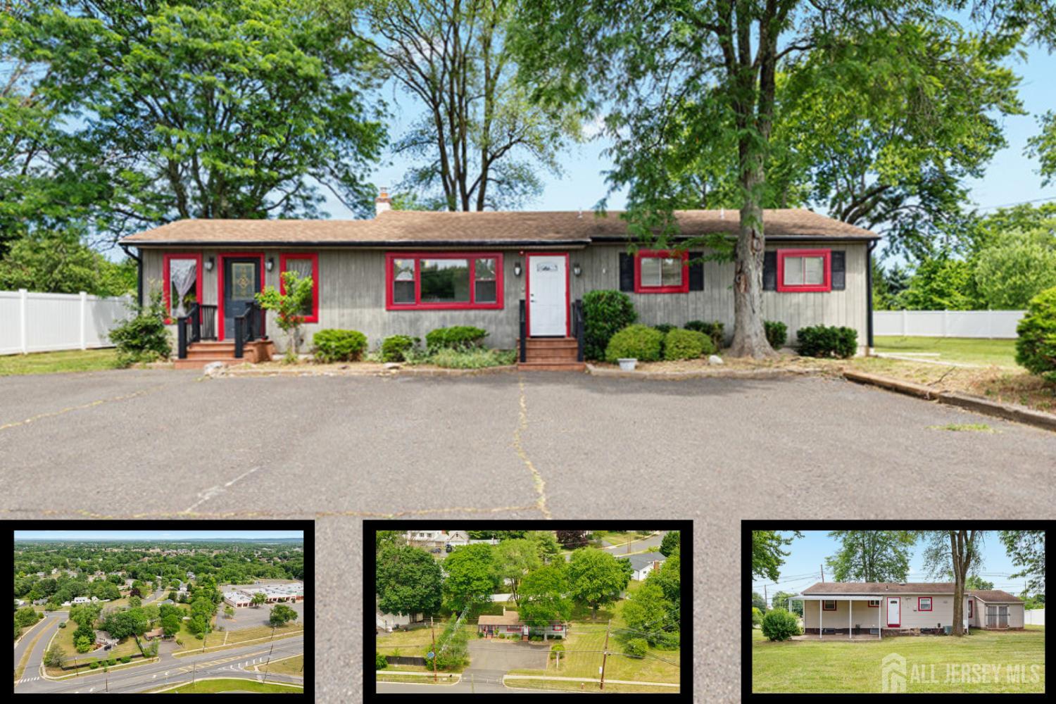 Front Exterior & Parking Lot: Spacious property with room for expansion offering private parking.