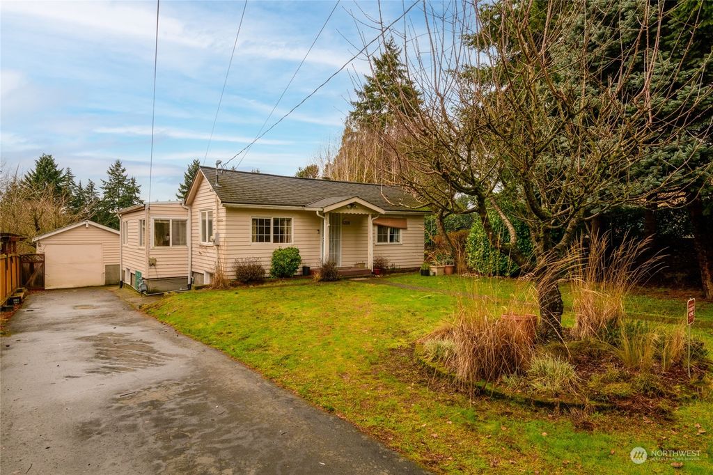 Photo of 12031 40th Avenue NE, Seattle, WA 98125 (MLS # 2199089)