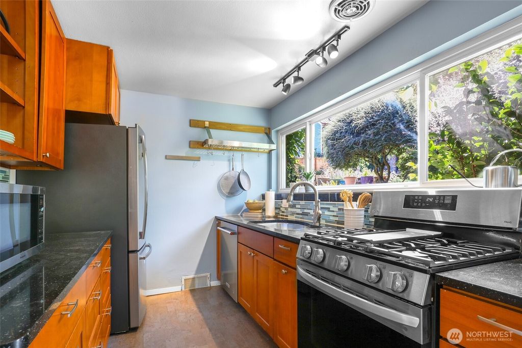 Photo of 4707 50th Avenue S, Seattle, WA 98118 (MLS # 2424375)