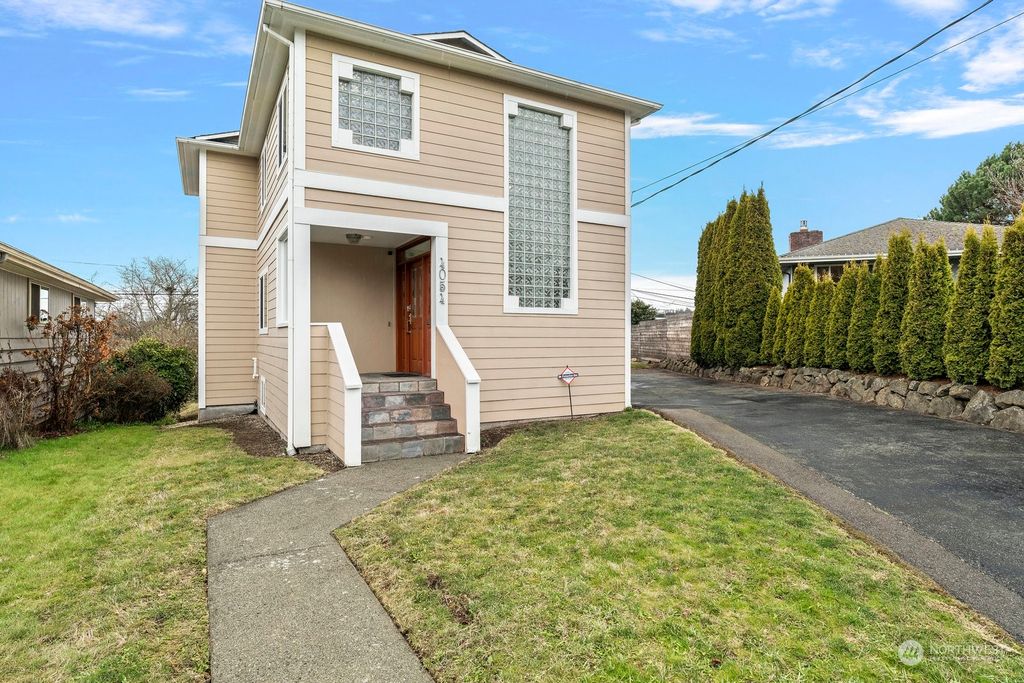 Photo of 4054 34th Avenue SW, Seattle, WA 98126 (MLS # 2045114)