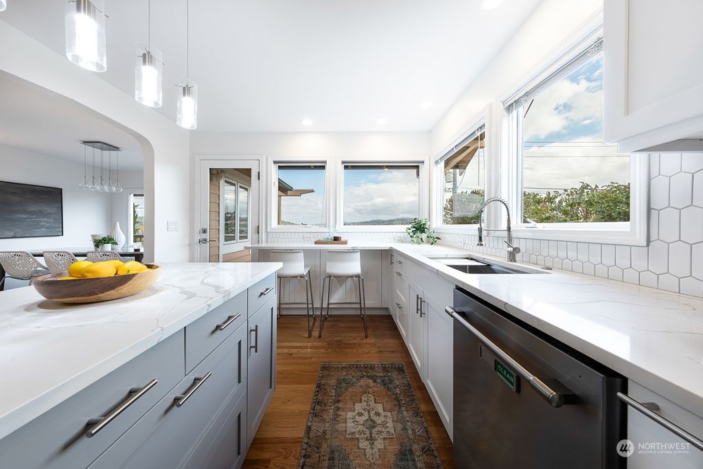 Photo of 10637 Rainier Avenue S, Seattle, WA 98178 (MLS # 2296285)