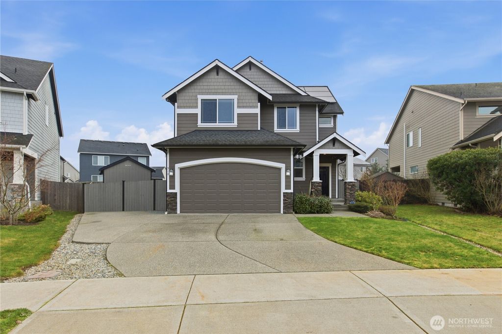 Photo of 910 Boatman Ave NW, Orting, WA 98360 (MLS # 2471099)