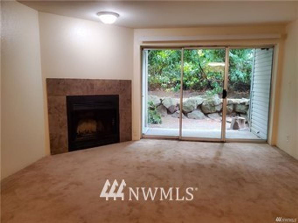 Photo of 1522 NE 175th Street #111, Shoreline, WA 98155 (MLS # 1957064)