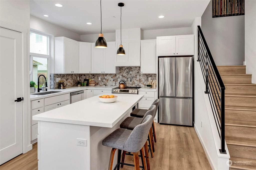 Photo of 8052 Mary Avenue NW #A, Seattle, WA 98117 (MLS # 2184225)