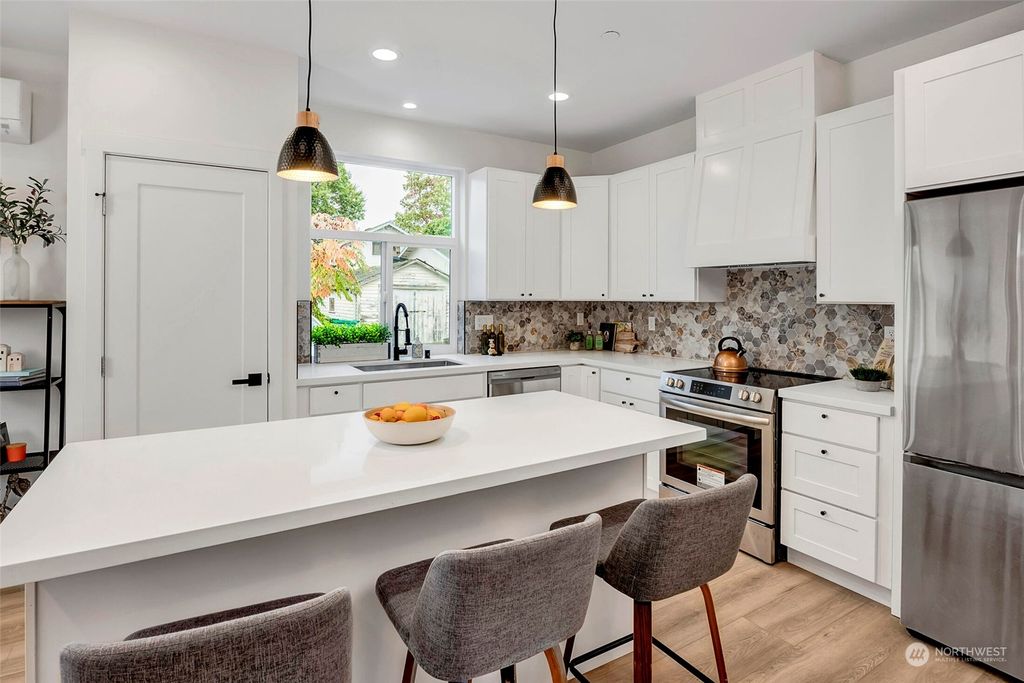 Photo of 8052 Mary Avenue NW #A, Seattle, WA 98117 (MLS # 2184225)