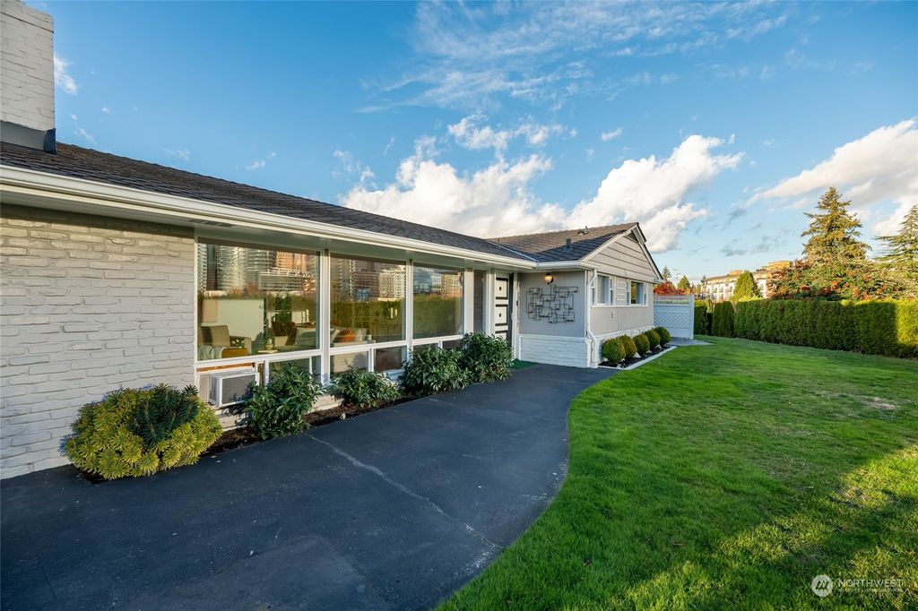 Photo of 9850 Belfair Road, Bellevue, WA 98004 (MLS # 2318940)