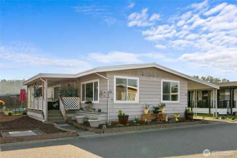 Photo of 1402 22nd Street NE #300, Auburn, WA 98002 (MLS # 2428170)