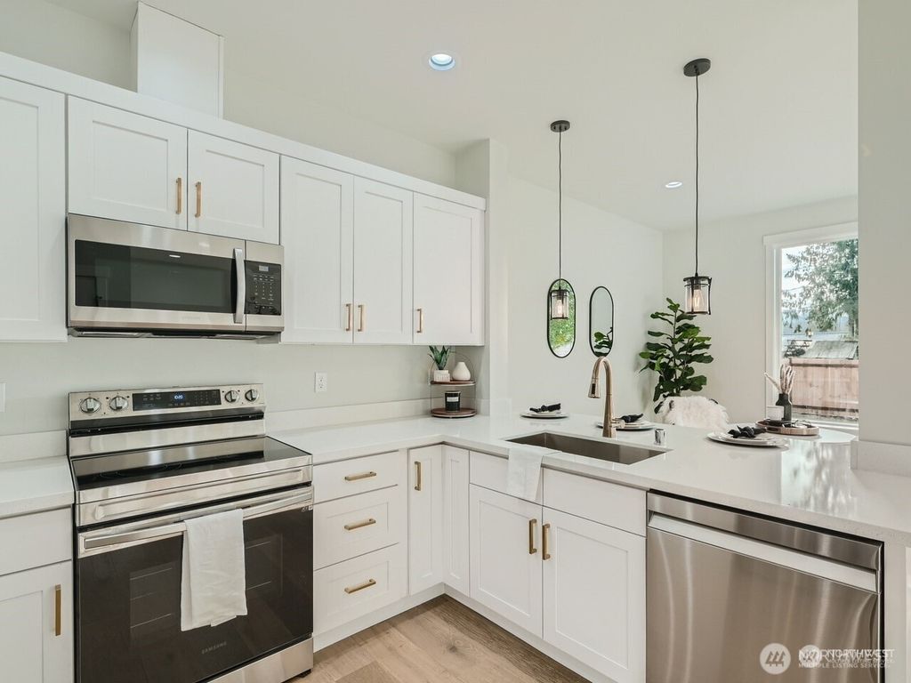 Photo of 204 date Avenue, Sultan, WA 98294 (MLS # 2435970)