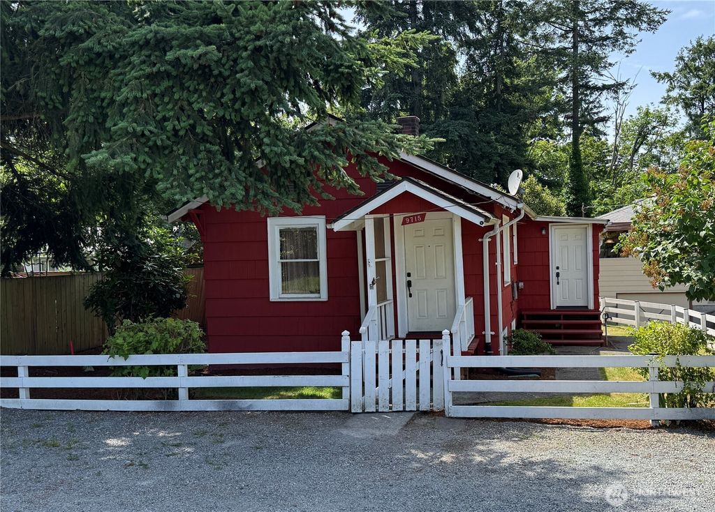 Photo of 9715 37th Avenue SW, Seattle, WA 98126 (MLS # 2410220)