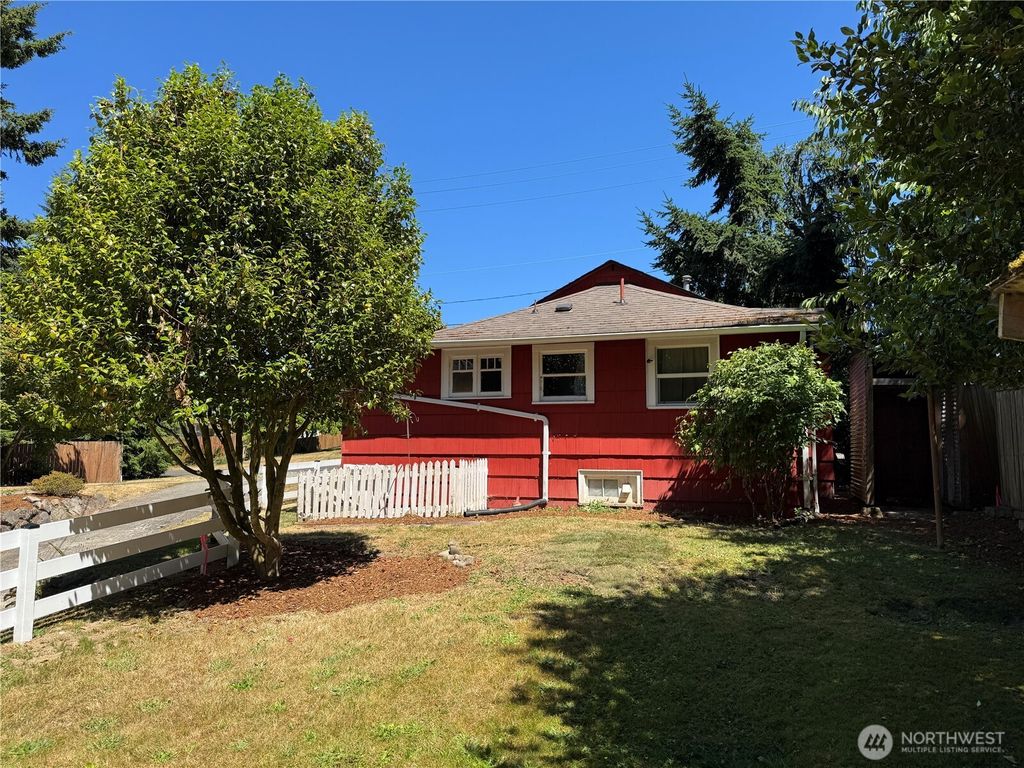 Photo of 9715 37th Avenue SW, Seattle, WA 98126 (MLS # 2410220)