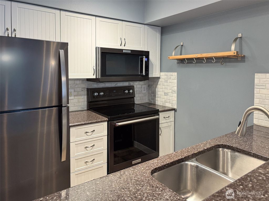 Photo of 1545 NW 57th Street #302, Seattle, WA 98107 (MLS # 2464620)