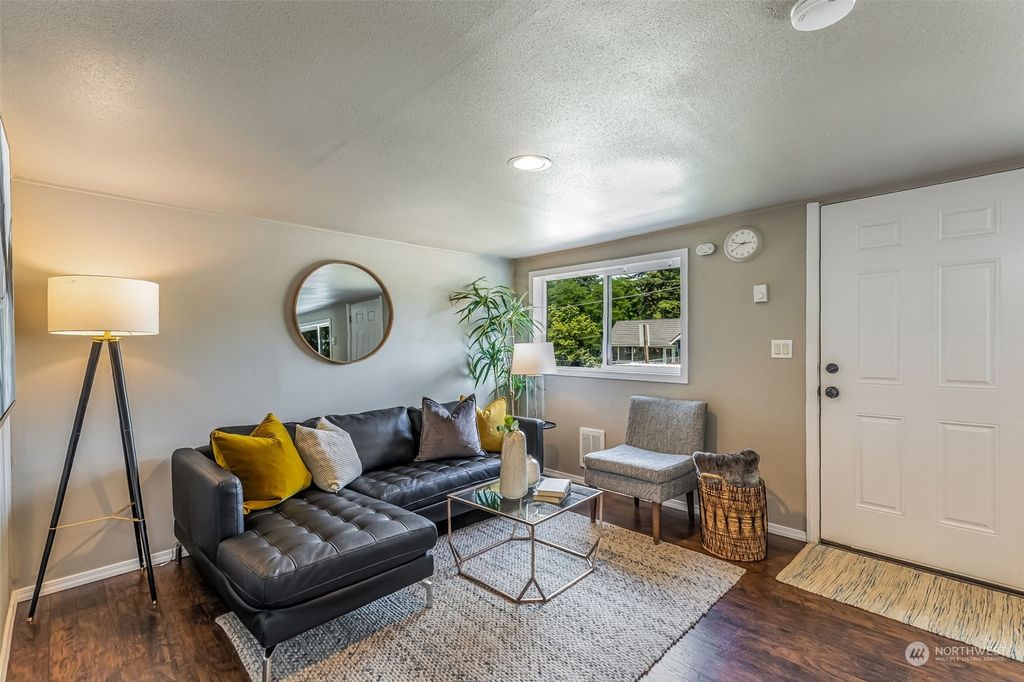 Photo of 10757 18th Avenue SW, Seattle, WA 98146 (MLS # 2136826)