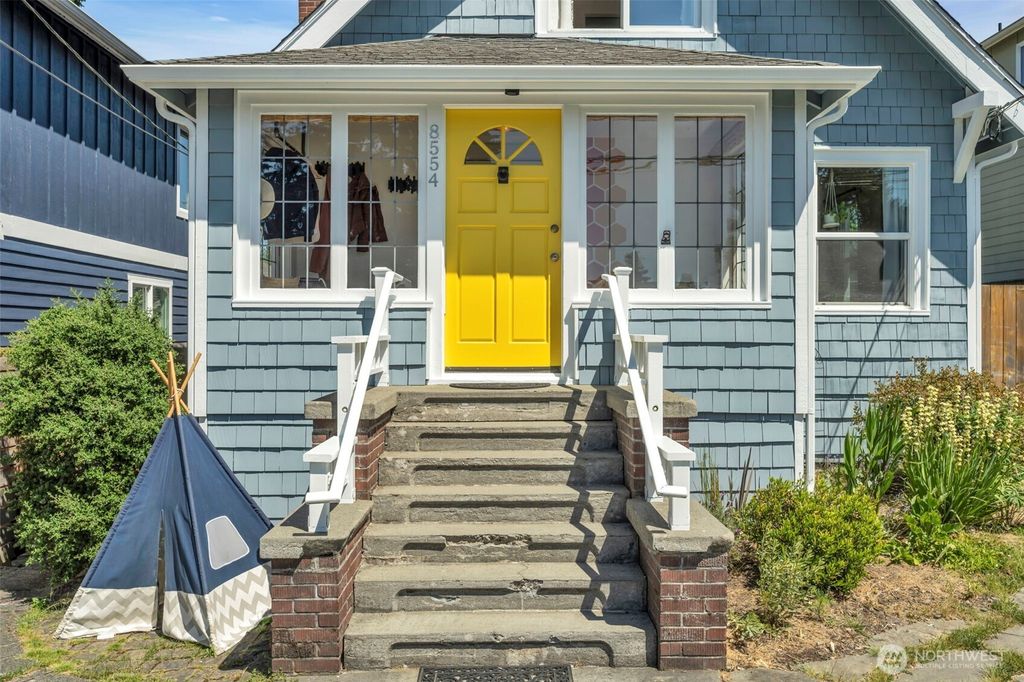 Photo of 8554 16th Avenue NW, Seattle, WA 98117 (MLS # 2404521)