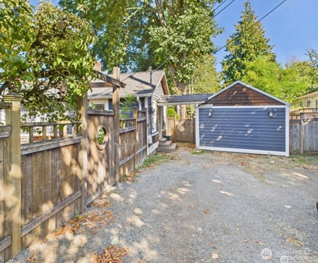 Photo of 12026 Sand Point NE, Seattle, WA 98125 (MLS # 2433571)