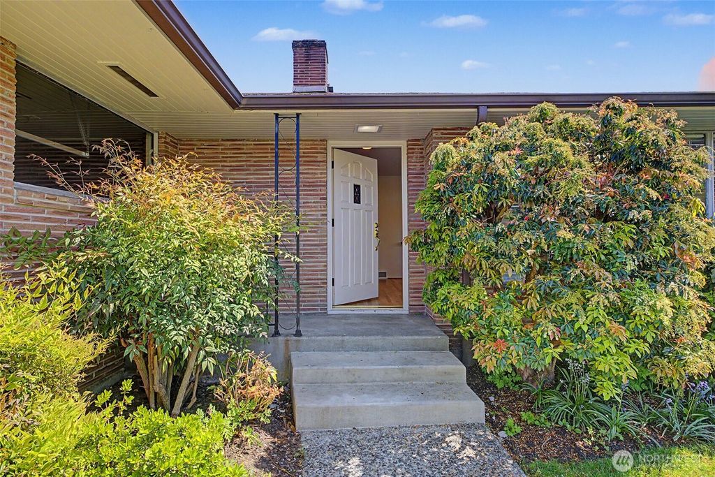 Photo of 10720 11 Avenue NW, Seattle, WA 98177 (MLS # 2515030)