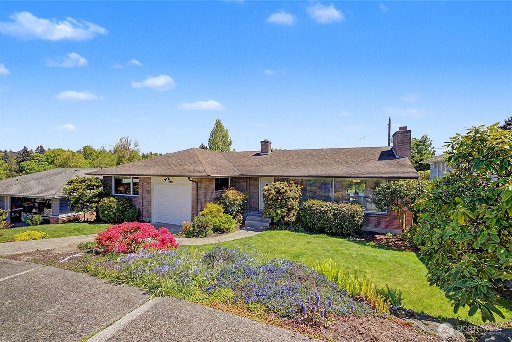 Photo of 10720 11 Avenue NW, Seattle, WA 98177 (MLS # 2515030)